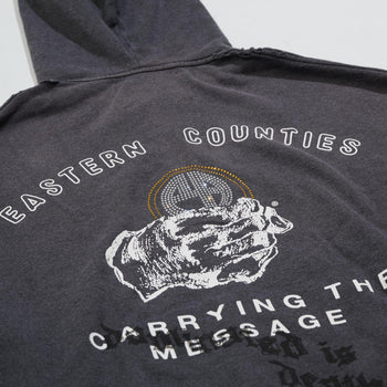 CARRYING THE MESSAGE ZIP HOODIE