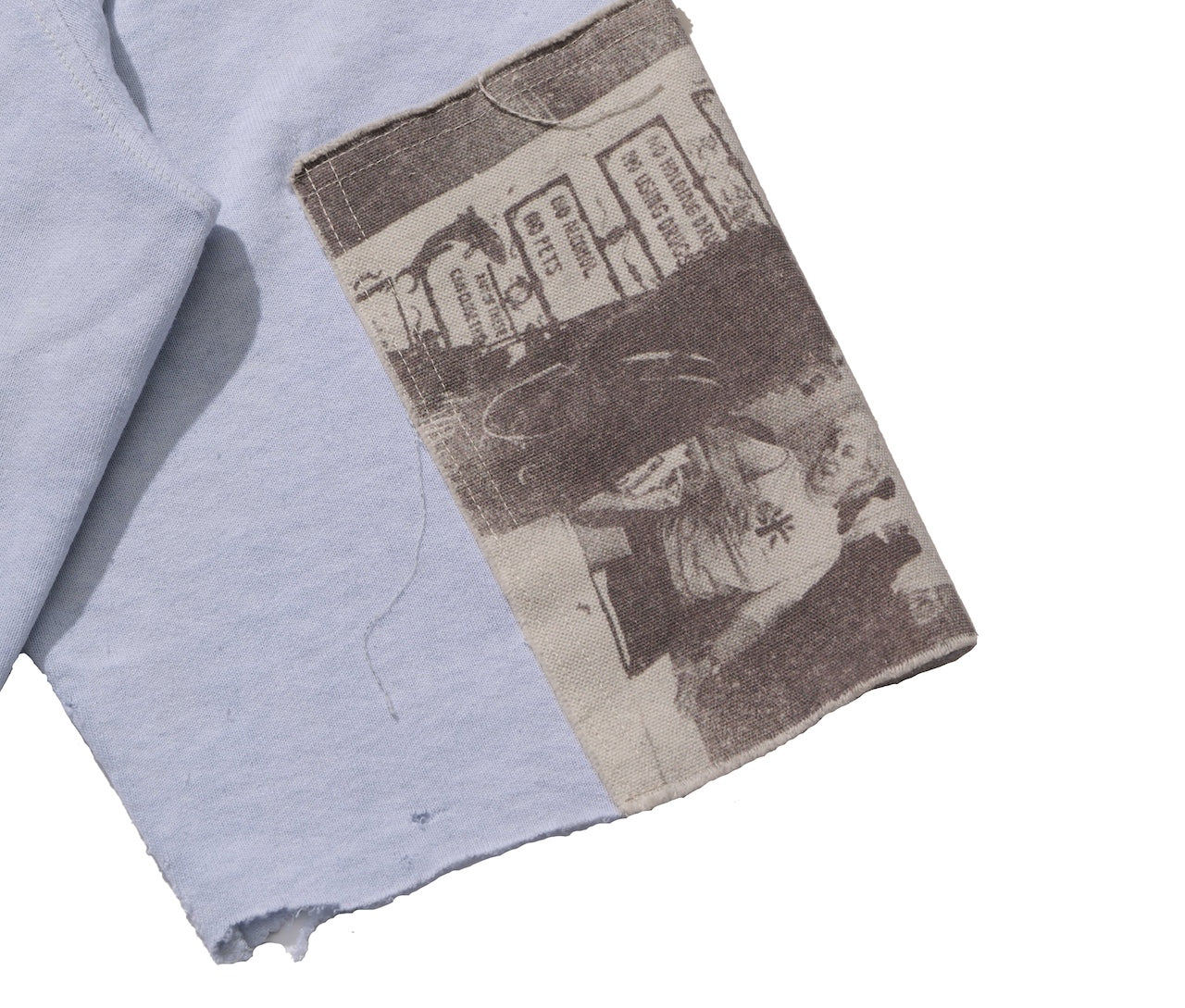 LOVE NEEDS CARE CREWNECK