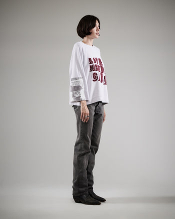 LOVE NEEDS CARE CREWNECK