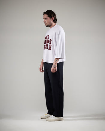 LOVE NEEDS CARE CREWNECK